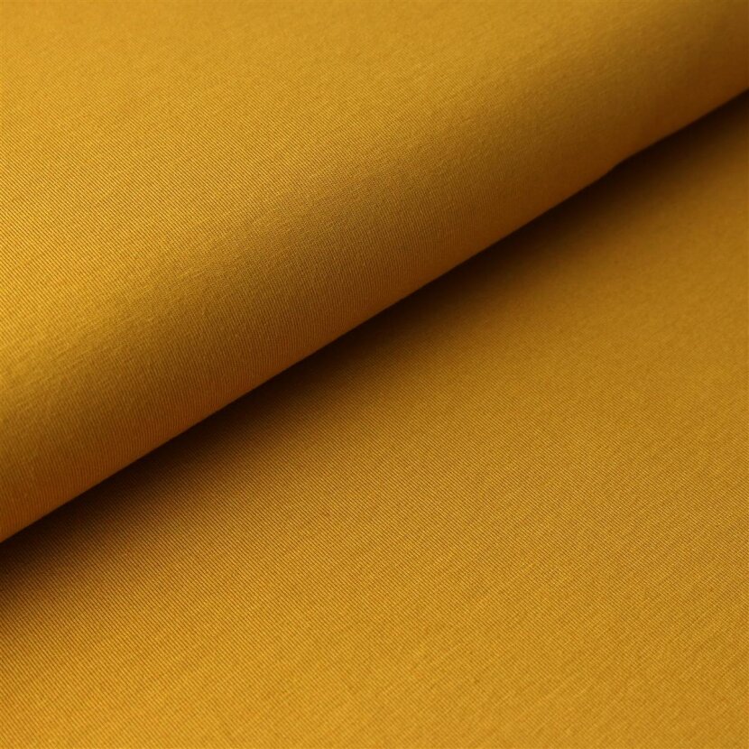 "Solid Mustard Cotton Jersey: Versatile and Comfortable"
